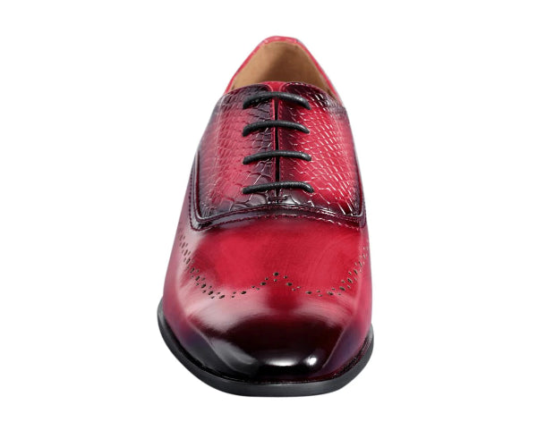 Red leather dress shoe on a white background