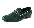 Green patterned loafer shoe on a white background