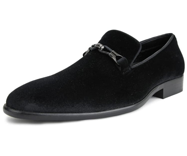 Black velvet loafer shoe on a white background