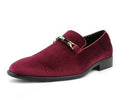 Maroon velvet loafer with a decorative strap on a white background