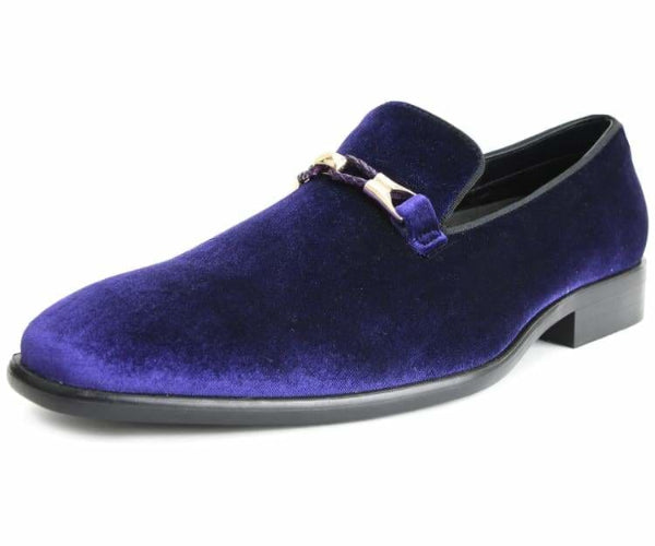 Purple velvet loafer with a gold buckle on a white background