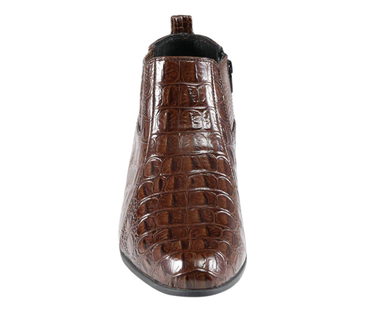 Brown crocodile-patterned shoe on a white background