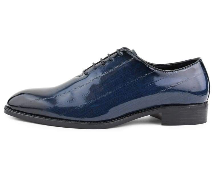 Make a statement with the Brayden Two‑Tone Exotic Oxford—bold men’s dress shoes with faux‑exotic print, ombre toe, and sleek style for parties and special events.